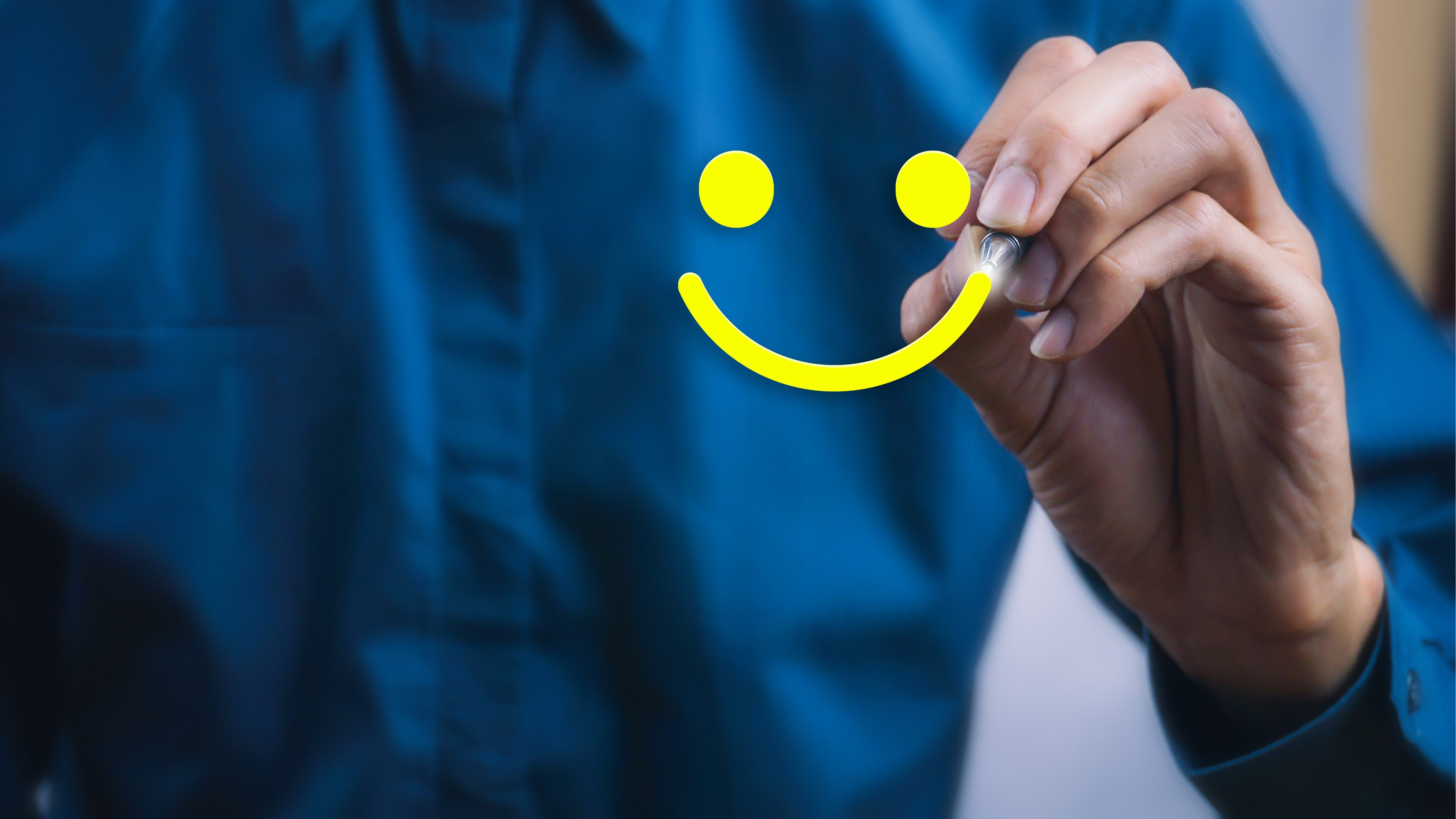 Conceptual the customer responded to the survey. The client using digital pen write happy face smile icon. Depicts that customer is very satisfied. Service experience and satisfaction concept.