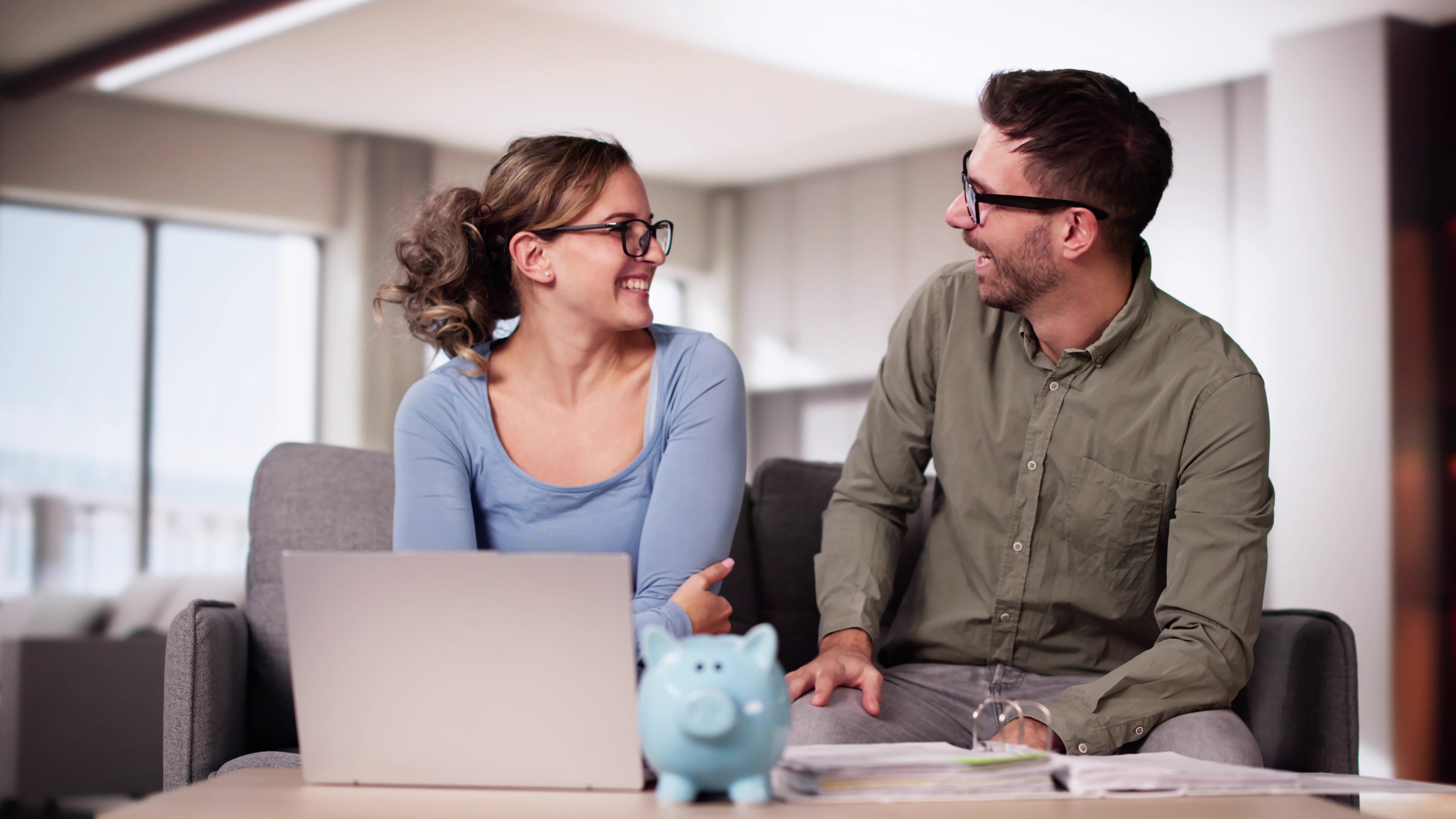 Save Money For Retirement Plan. Young Couple Budgeting